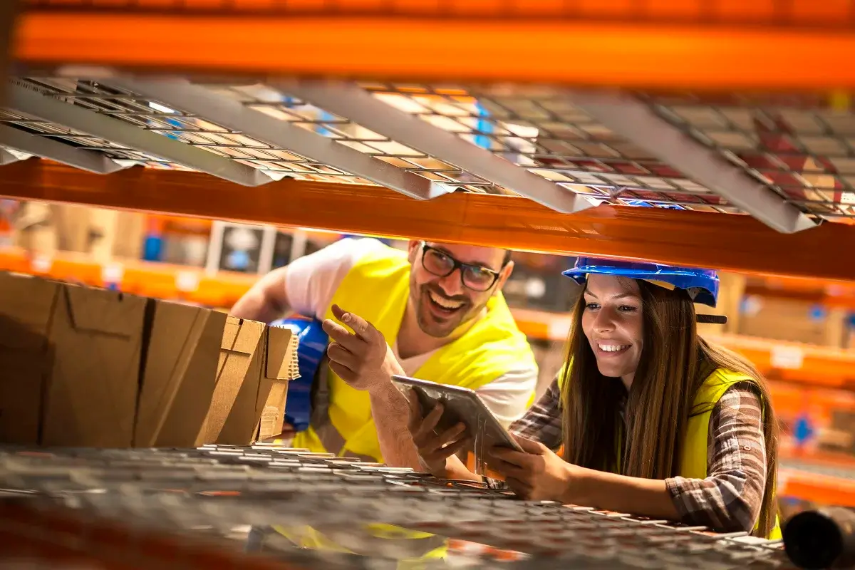 warehouse-workers-counting-boxes-shelves-large-distribution-warehouse (2) warehouse-workers-counting-boxes-shelves-large-distribution-warehouse (2)